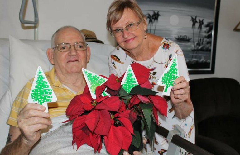 Henry illuminates tree for Highway Hospice