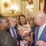 St Christopher’s has audience with King and Queen