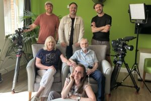 Dave & Kate Gilmore (centre), with BBC crew (back) and Christine Harris (Front)