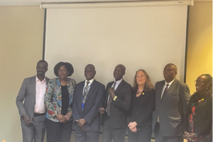 Group Photo by Chief Guest Commissioner Non-Communicable Diseases (Middle) Representing Permanent Secretary, MOH; WHO Representatives; The Global Director Union for International Cancer Control (UICC), MOH Officials, NDA officials, and ATOM Initiative Members in Uganda