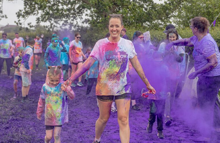 Rainbow Runners in good spirits despite wet weather