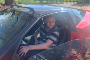 Donavan in his dream car